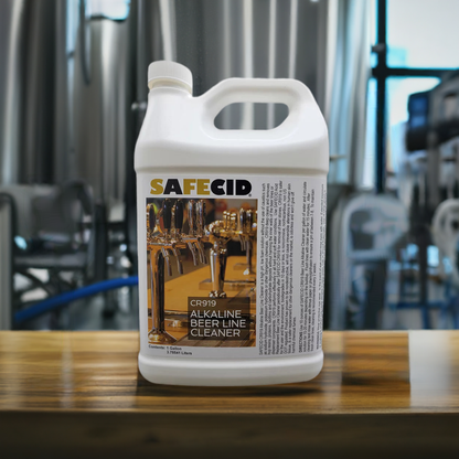 A one gallon bottle of SAFECID Alkaline Beer Line Cleaner with a label showing the product name and an image of a beer tap in the background.